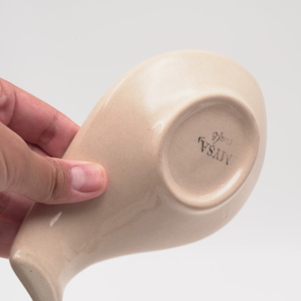Ceramic spoon rest with unique handmade painting, embossed with red authentic patterns