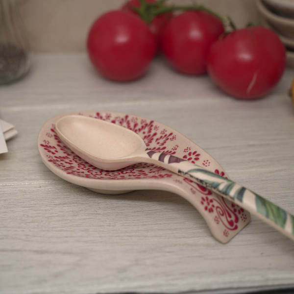 Ceramic spoon rest with unique handmade painting, embossed with red authentic patterns