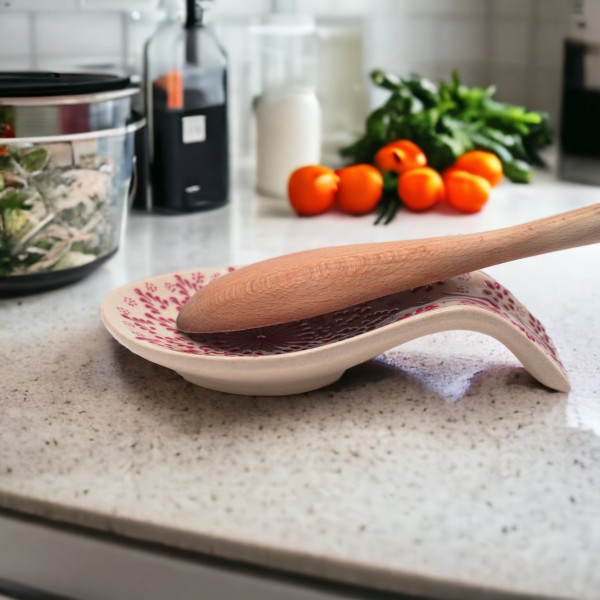 Ceramic spoon rest with unique handmade painting, embossed with red authentic patterns
