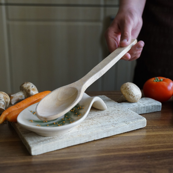 Ceramic spoon rest with unique handmade painting, embossed with red authentic patterns