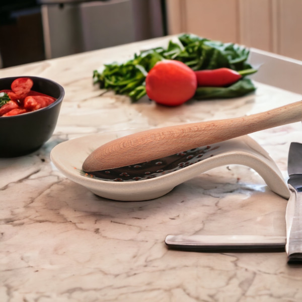 Ceramic spoon rest with unique handmade painting, embossed with red authentic patterns